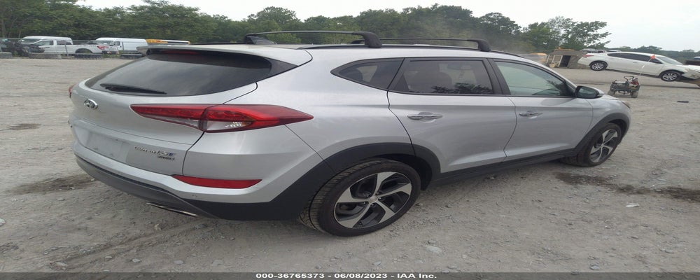 KM8J3CA27GU156970 2016 HYUNDAI TUCSON photo no. 4