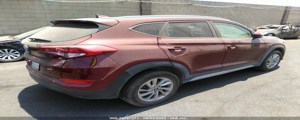 KM8J3CA43JU616411 2018 HYUNDAI TUCSON photo no. 4