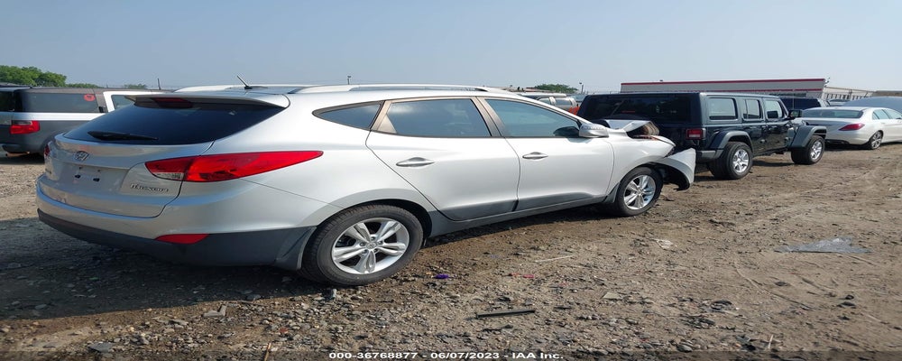 KM8JU3AC3CU353764 2012 HYUNDAI TUCSON photo no. 4