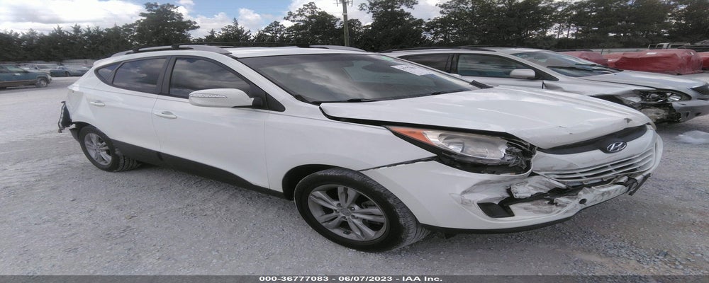 KM8JU3AC4CU340585 2012 HYUNDAI TUCSON photo no. 24
