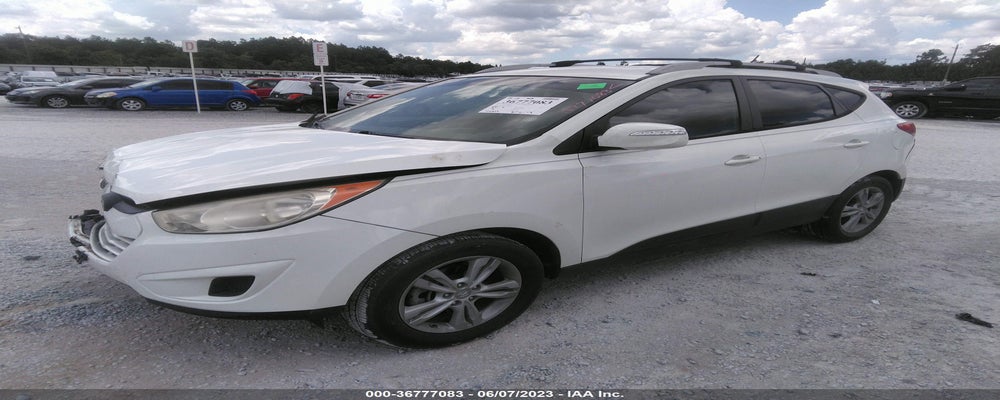 KM8JU3AC4CU340585 2012 HYUNDAI TUCSON photo no. 2