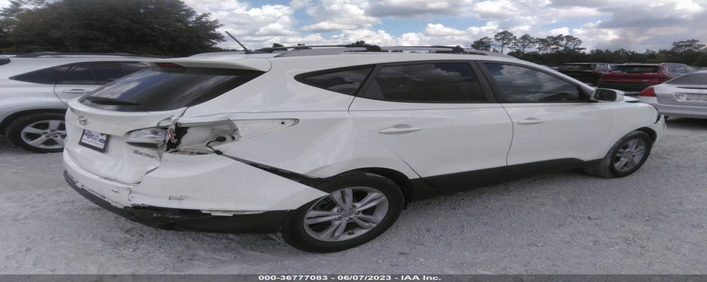 KM8JU3AC4CU340585 2012 HYUNDAI TUCSON photo no. 4