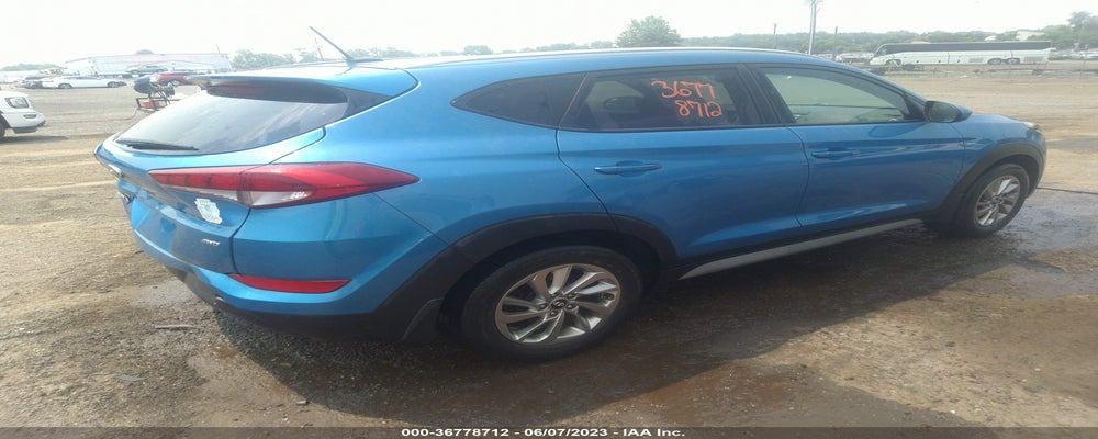 KM8J3CA46HU423115 2017 HYUNDAI TUCSON photo no. 4