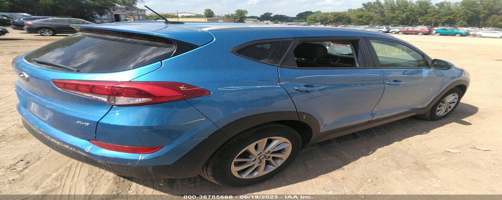 KM8J3CA4XGU144426 2016 HYUNDAI TUCSON photo no. 4