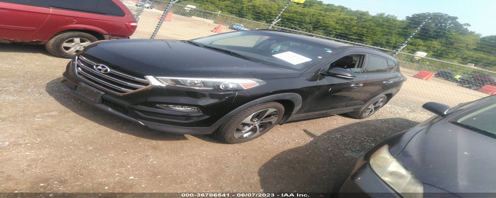 KM8J33A29GU066459 2016 HYUNDAI TUCSON photo no. 2