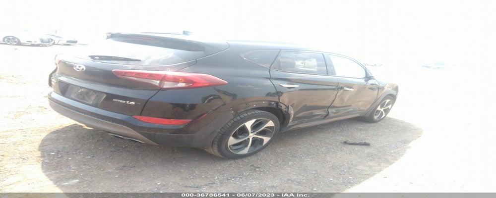 KM8J33A29GU066459 2016 HYUNDAI TUCSON photo no. 4
