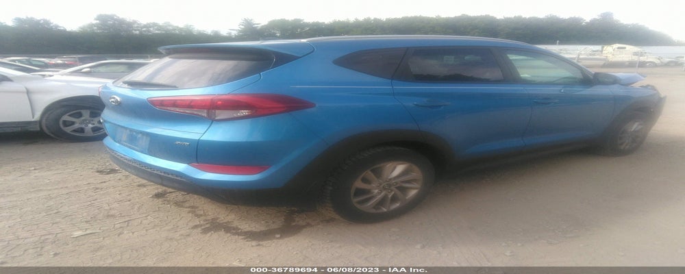 KM8J3CA42GU053232 2016 HYUNDAI TUCSON photo no. 4