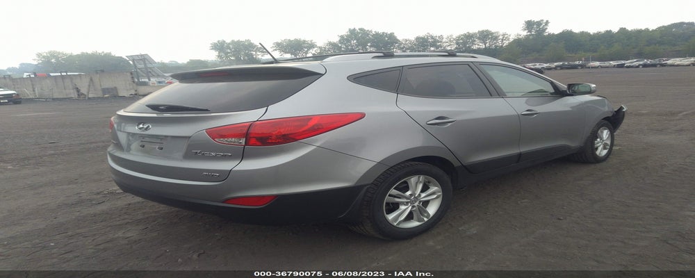 KM8JUCAC7CU534690 2012 HYUNDAI TUCSON photo no. 4