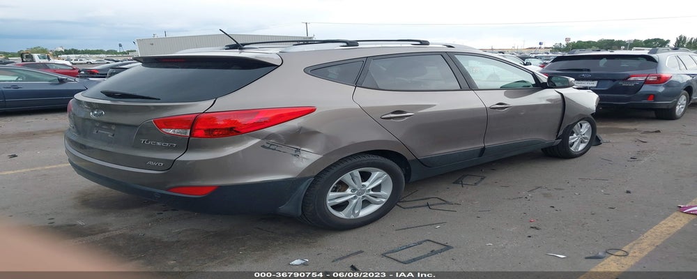 KM8JUCAC5DU620288 2013 HYUNDAI TUCSON photo no. 4