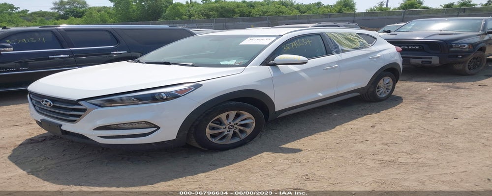 KM8J3CA49JU609592 2018 HYUNDAI TUCSON photo no. 2