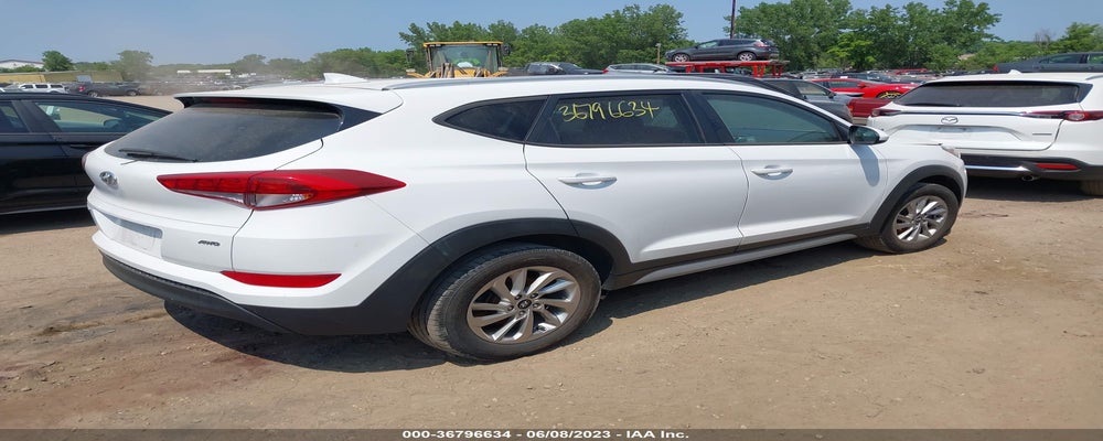 KM8J3CA49JU609592 2018 HYUNDAI TUCSON photo no. 4