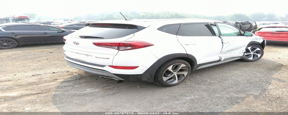 KM8J33A21HU471099 2017 HYUNDAI TUCSON photo no. 4