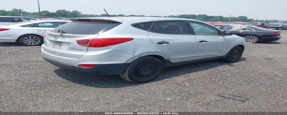 KM8JT3AB4DU769673 2013 HYUNDAI TUCSON photo no. 4