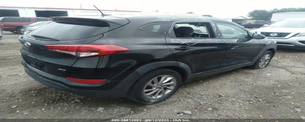 KM8J3CA44GU076740 2016 HYUNDAI TUCSON photo no. 4
