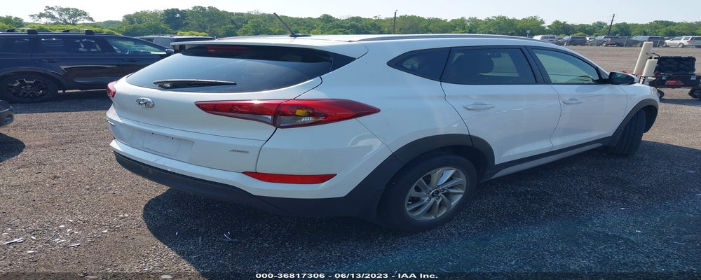 KM8J3CA43HU549027 2017 HYUNDAI TUCSON photo no. 4