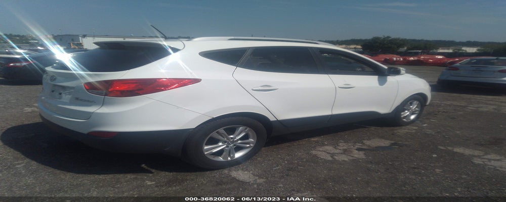 KM8JU3AC8DU709031 2013 HYUNDAI TUCSON photo no. 4