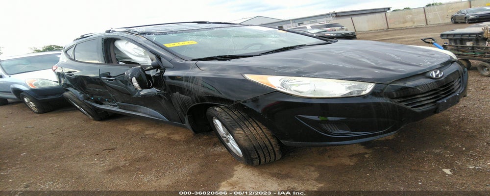 KM8JUCAC3CU395030 2012 HYUNDAI TUCSON photo no. 9