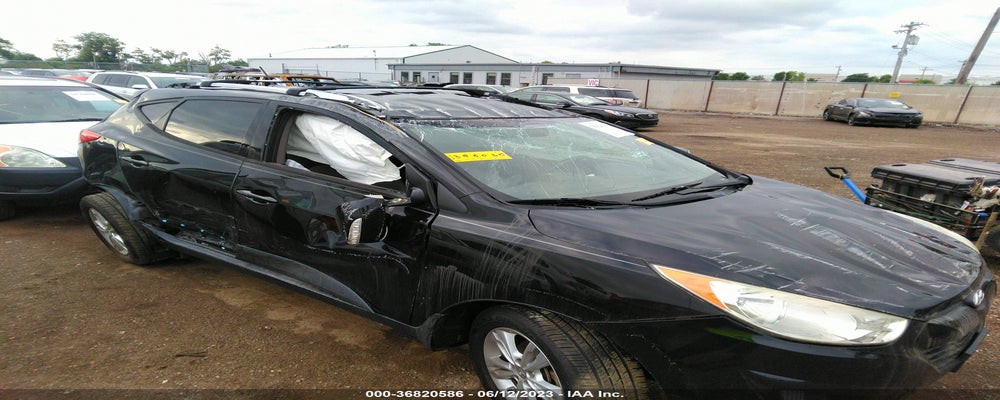 KM8JUCAC3CU395030 2012 HYUNDAI TUCSON photo no. 6