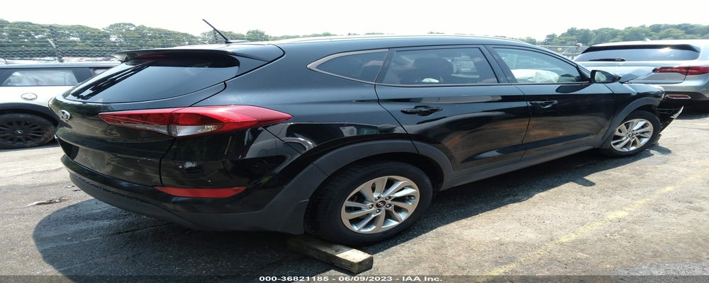 KM8J33A44GU242514 2016 HYUNDAI TUCSON photo no. 4