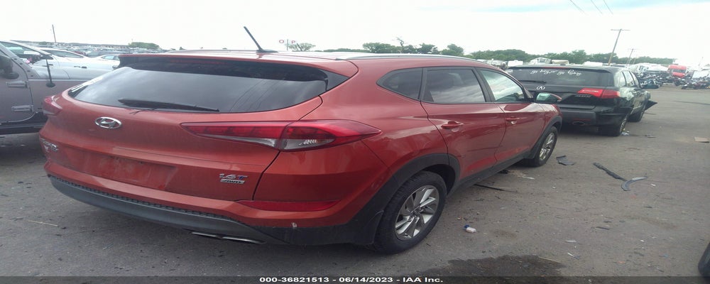 KM8J3CA2XGU158504 2016 HYUNDAI TUCSON photo no. 4
