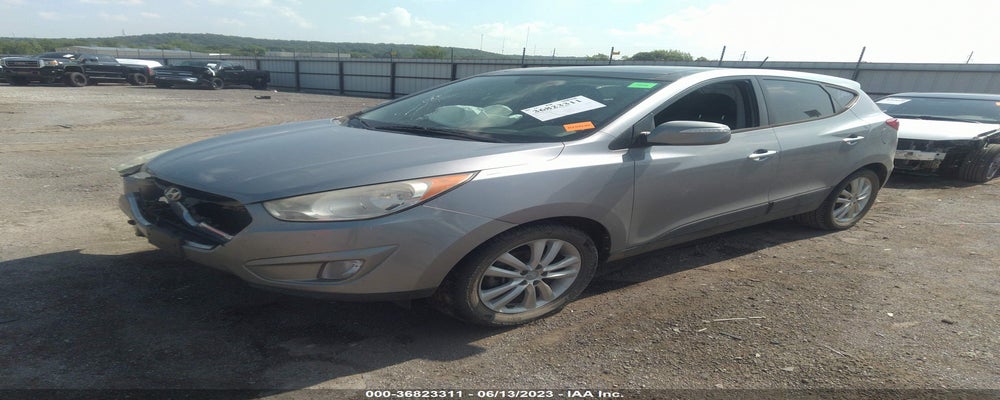 KM8JU3AC7CU489833 2012 HYUNDAI TUCSON photo no. 2