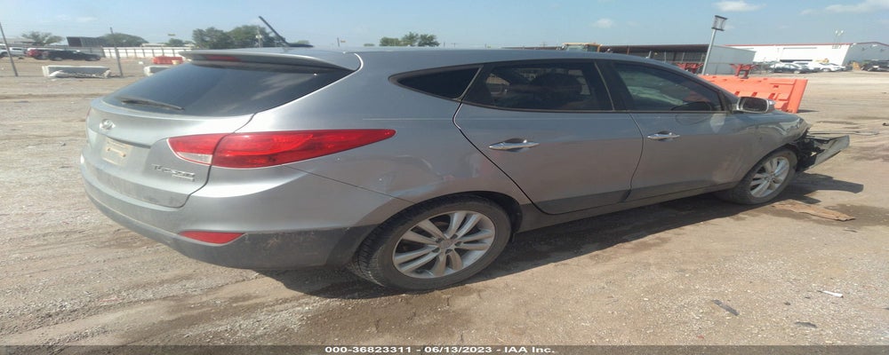 KM8JU3AC7CU489833 2012 HYUNDAI TUCSON photo no. 4