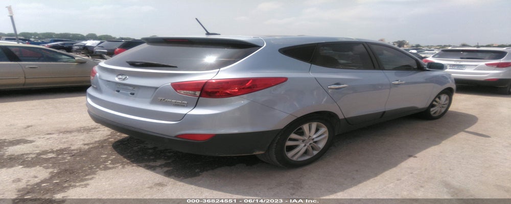 KM8JU3AC2DU616795 2013 HYUNDAI TUCSON photo no. 4
