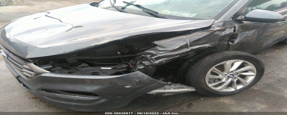 KM8J3CA49GU022611 2016 HYUNDAI TUCSON photo no. 6