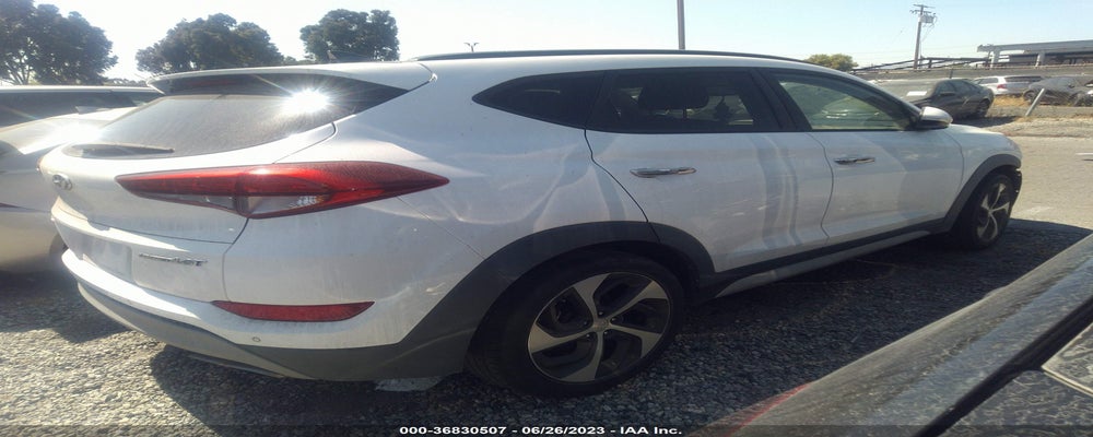 KM8J33A21HU590433 2017 HYUNDAI TUCSON photo no. 4