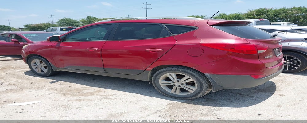 KM8JU3AC4DU562156 2013 HYUNDAI TUCSON photo no. 3
