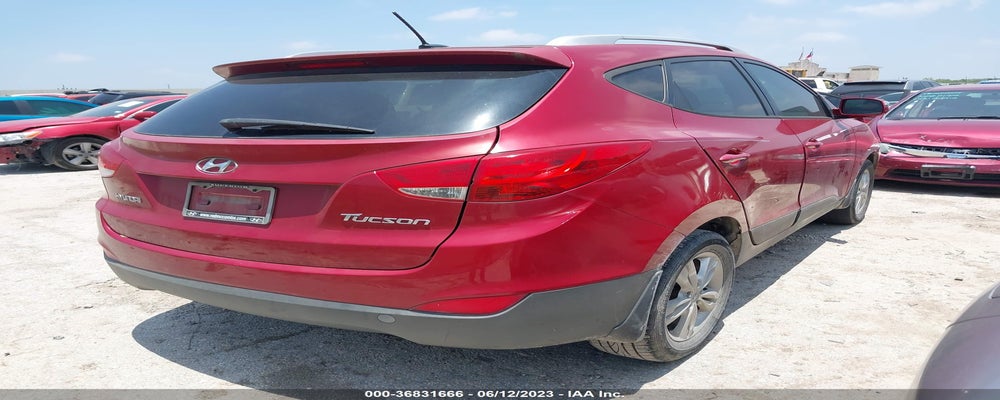 KM8JU3AC4DU562156 2013 HYUNDAI TUCSON photo no. 4