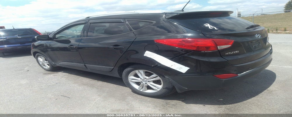 KM8JUCAC0CU528844 2012 HYUNDAI TUCSON photo no. 3