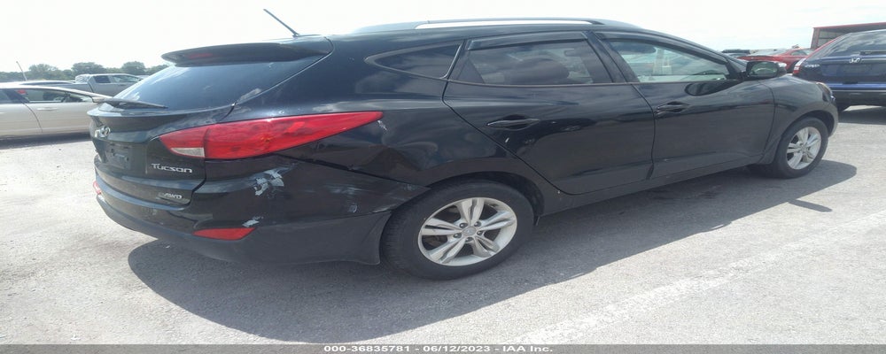 KM8JUCAC0CU528844 2012 HYUNDAI TUCSON photo no. 4