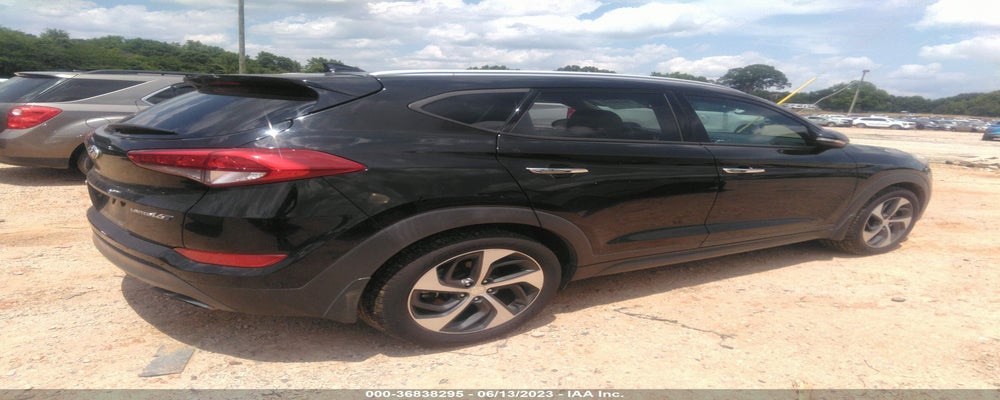 KM8J33A23GU220986 2016 HYUNDAI TUCSON photo no. 4