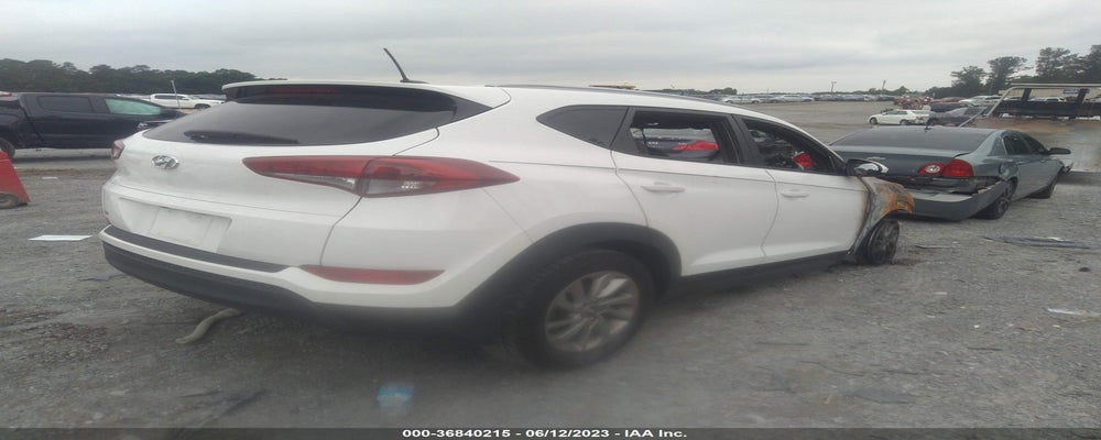 KM8J33A4XGU075138 2016 HYUNDAI TUCSON photo no. 4