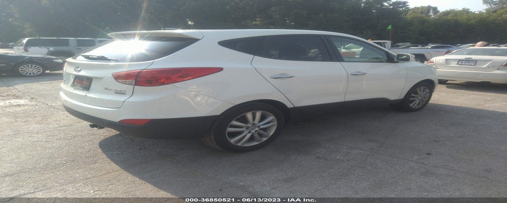 KM8JU3AC7CU521745 2012 HYUNDAI TUCSON photo no. 4