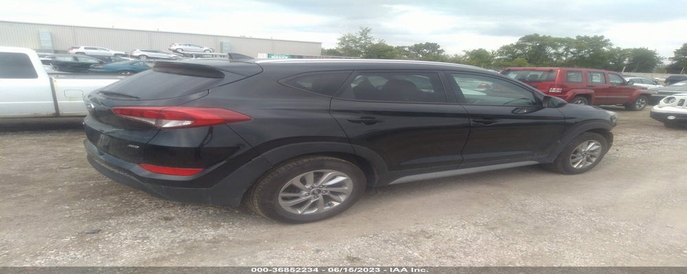 KM8J3CA42JU613130 2018 HYUNDAI TUCSON photo no. 4
