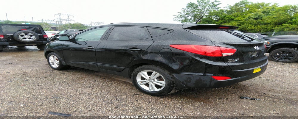 KM8JU3AC8DU715041 2013 HYUNDAI TUCSON photo no. 3