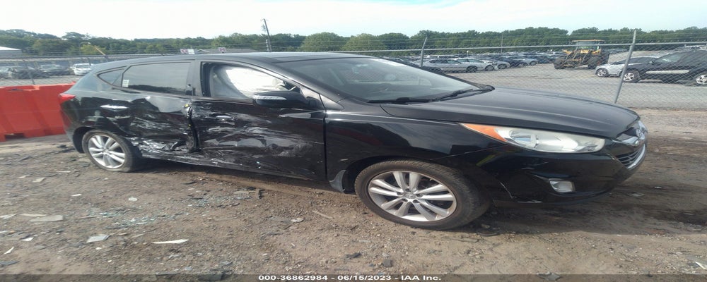 KM8JU3AC0CU435354 2012 HYUNDAI TUCSON photo no. 24