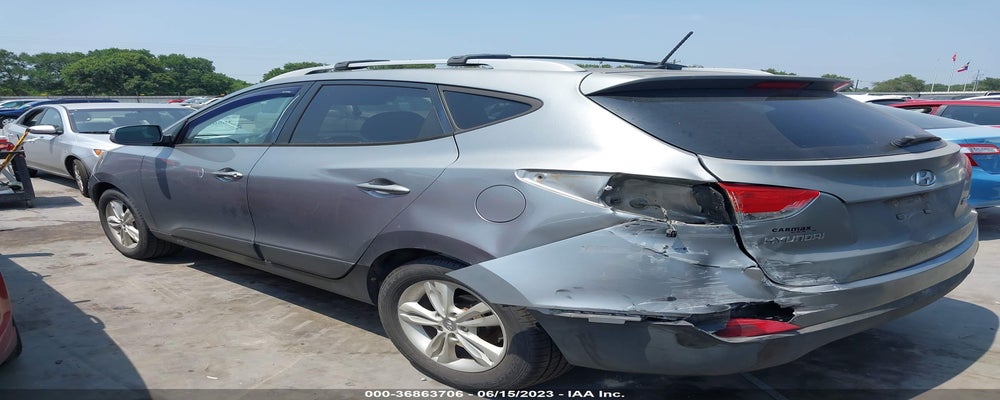 KM8JU3AC8DU689430 2013 HYUNDAI TUCSON photo no. 3