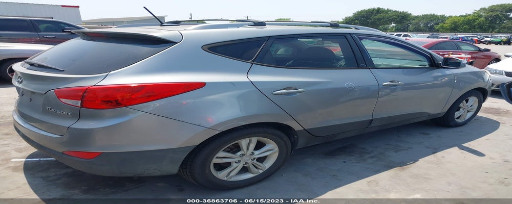 KM8JU3AC8DU689430 2013 HYUNDAI TUCSON photo no. 4