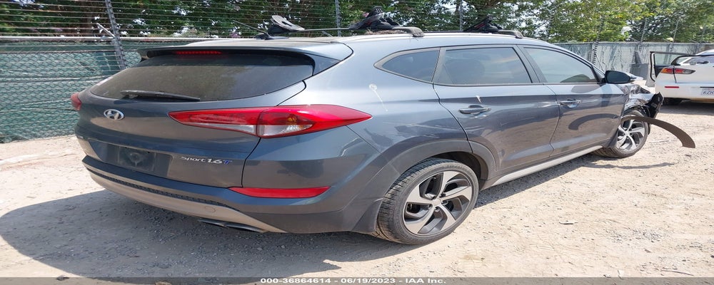 KM8J33A24HU473039 2017 HYUNDAI TUCSON photo no. 4
