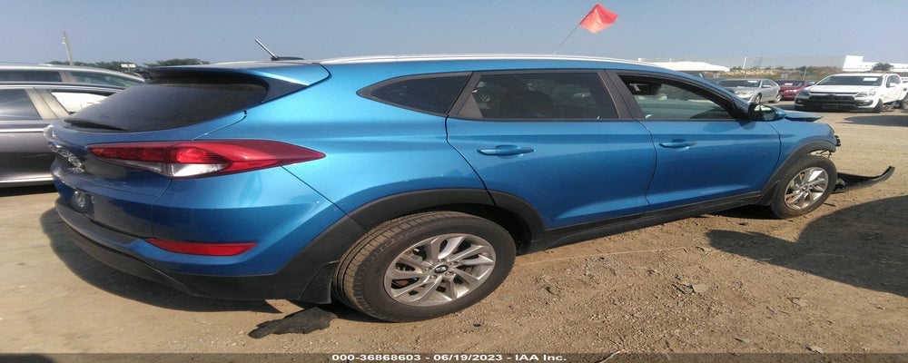 KM8J33A40GU154561 2016 HYUNDAI TUCSON photo no. 4