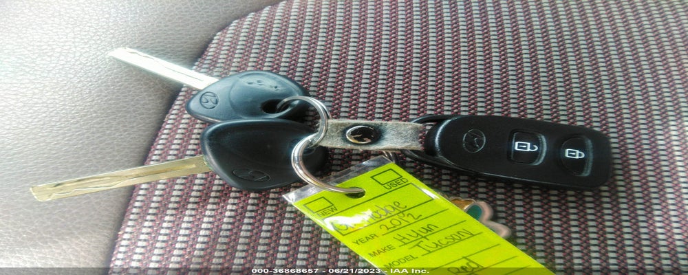 KM8JU3AC9CU385926 2012 HYUNDAI TUCSON photo no. 11