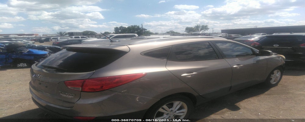 KM8JU3AC1BU213503 2011 HYUNDAI TUCSON photo no. 4