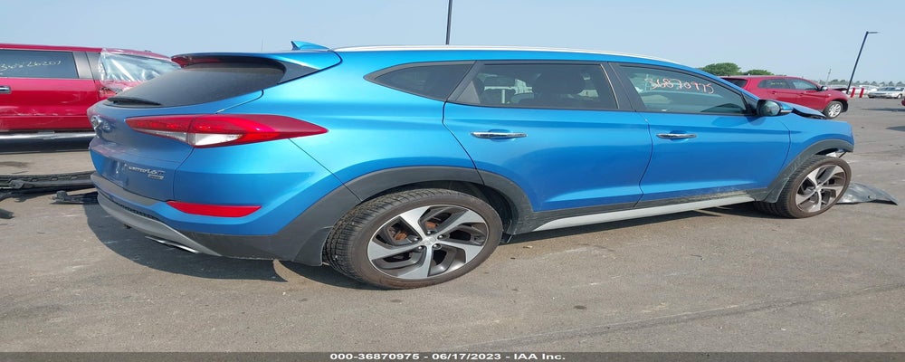 KM8J3CA22HU446972 2017 HYUNDAI TUCSON photo no. 4