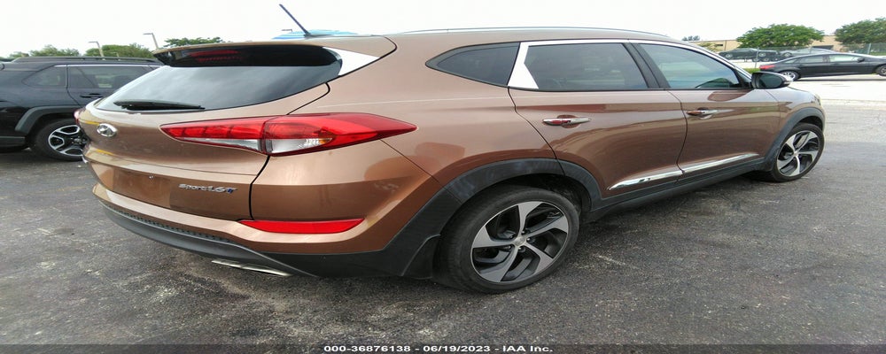 KM8J33A22GU104162 2016 HYUNDAI TUCSON photo no. 4