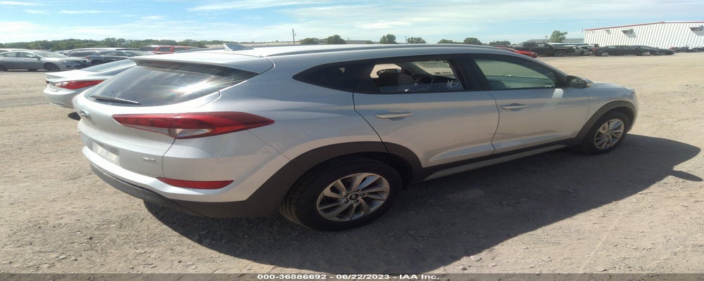 KM8J3CA41JU767747 2018 HYUNDAI TUCSON photo no. 4