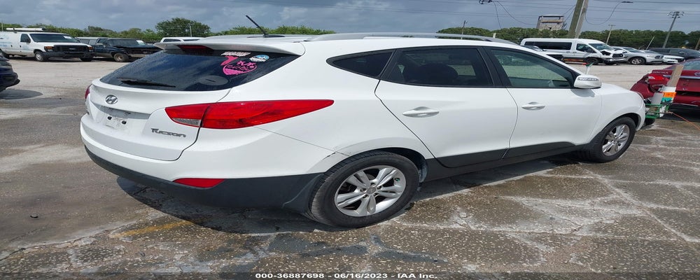 KM8JU3AC4DU760896 2013 HYUNDAI TUCSON photo no. 4