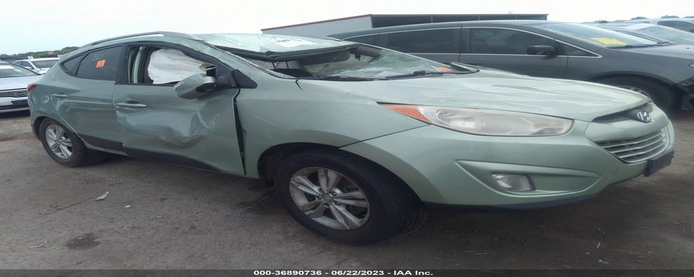 KM8JU3AC0DU561862 2013 HYUNDAI TUCSON photo no. 12